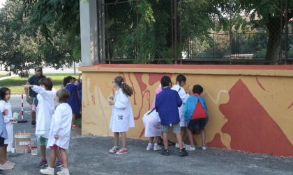 Ultimazione del murale della scuola del Quartiere Boschetto